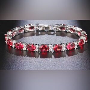 NWOT Elegant Women’s Synthetic Cubic Zirconia Red Color Bracelet SilverTone 7.6”